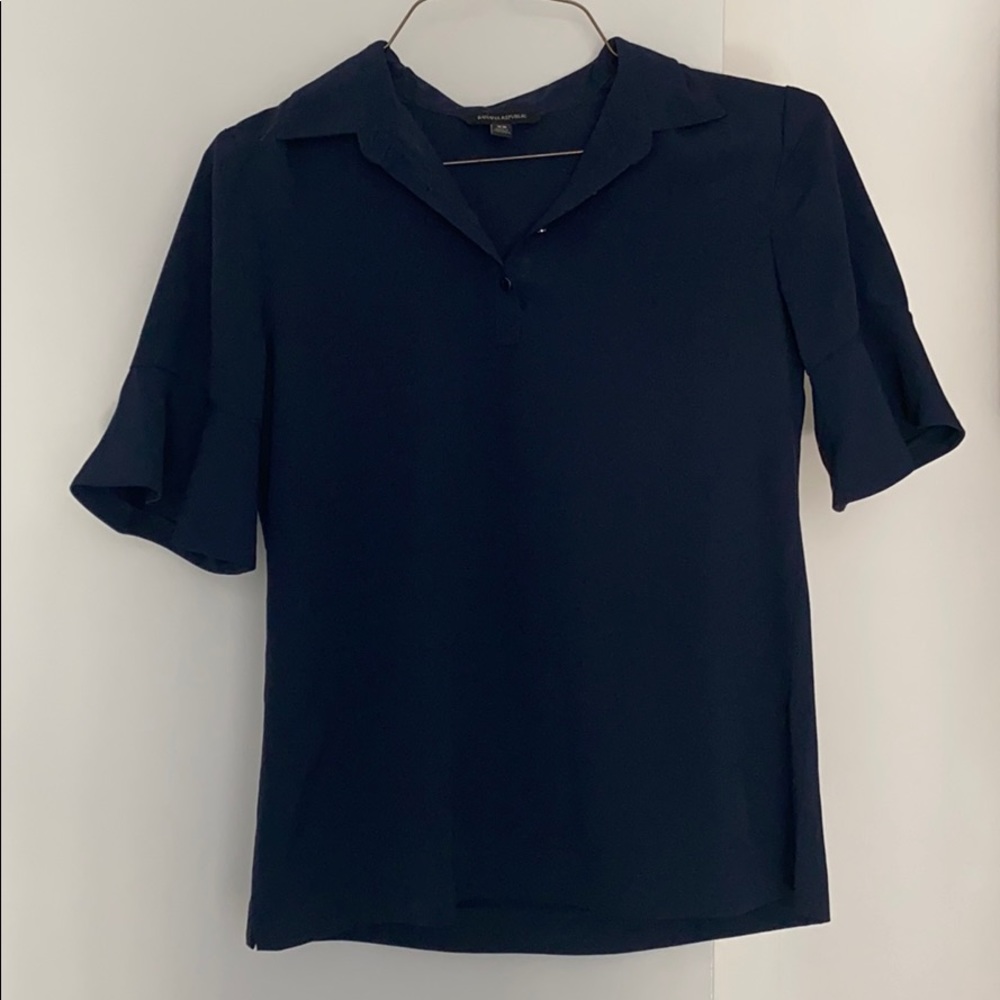 Work top with cute flare detail on sleeves!
